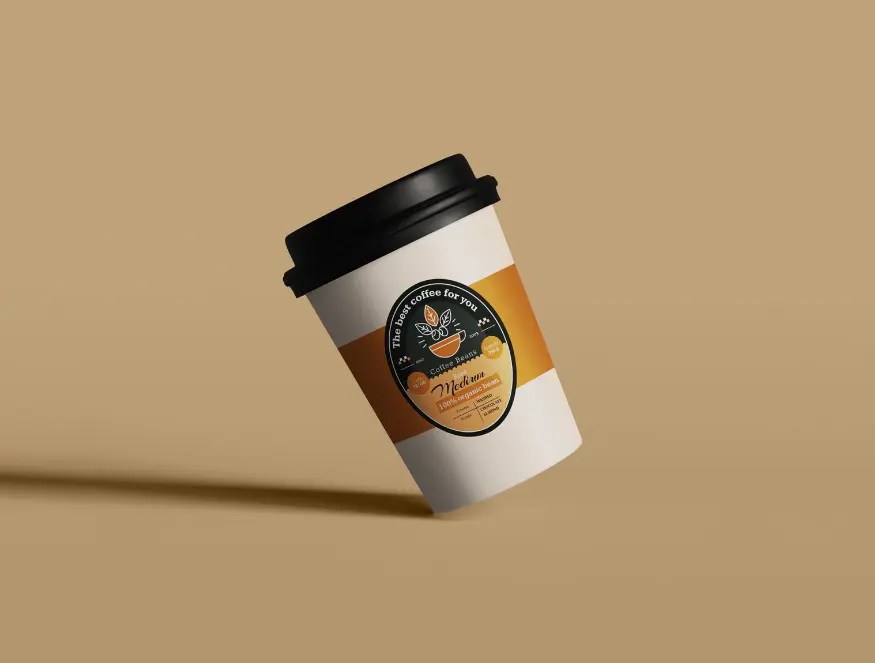 Free Tilted Paper Coffee Cup Mockup PSD